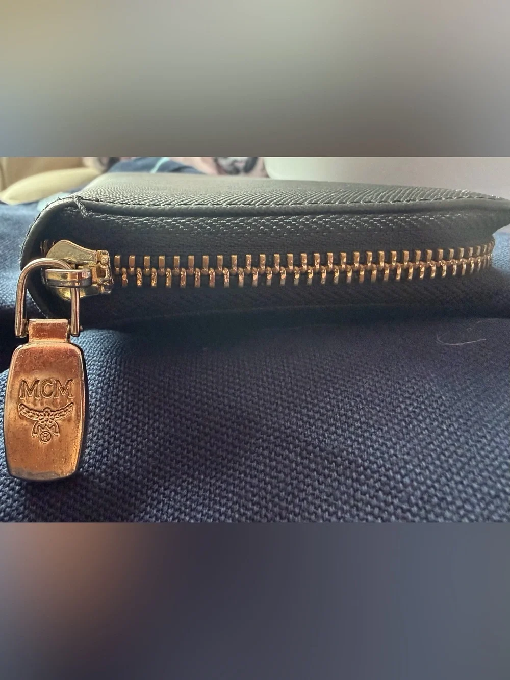 EUC - MCM Black Studded Zip-Around Wallet with Gold Logo